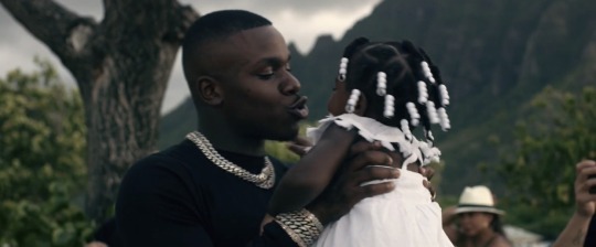 mahoganymamii:DaBaby and his daughter in “INTRO” (2019)