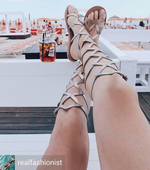 Sexy legs showing off gladiator sandals.