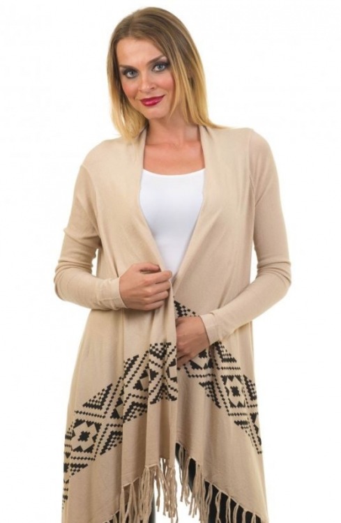 Our casual sweater wrap is accented with pretty fringe hem and a print for an added bohemian vibe. P