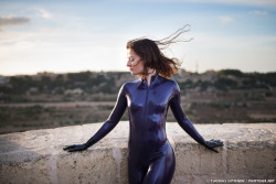 Kinky-Latex-Babes:leaning To The Wall Of The 4,000-Year-Old City Of Mdina, Malta