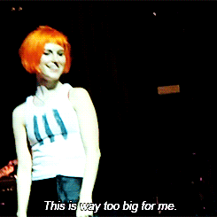 istillloveparamore:  omgparamoregifs-blog: Hayley and a bra thrown on stage x  slay!