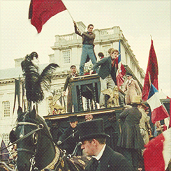 the-leader-in-red:I like how Grantaire’s the only one sitting and he’s beside the coachman as if to 