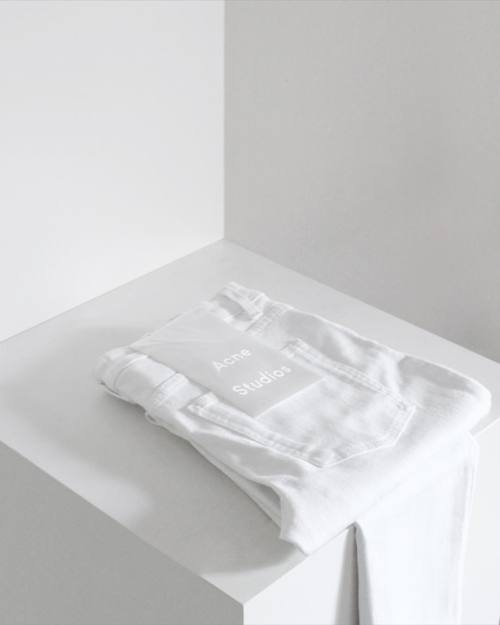 impertinence:  Summer whites ⚪️ Love that Acne defaults to white type for white pants. #details #acnestudios #whitedenim #summerwhites #myhouselookslikeastore #morninglight #minimal 