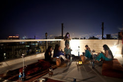 reportagebygettyimages:  BEIRUT, LEBANON Lebanese teenagers socialize on a residential rooftop during Ramadan before the sun comes up and they need to fast. Photo Natalie Naccache, from Walking in Circles
