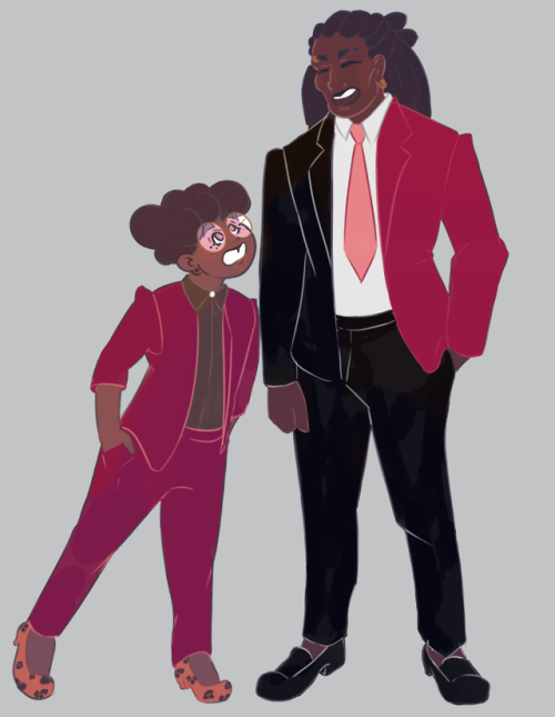 ask-reaper-and-son: [ID: an illustration of angus and Kravitz in matching suits. Angus is a short hu