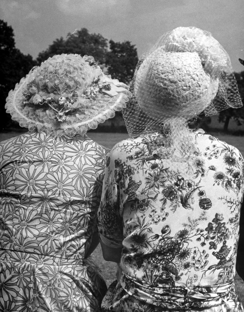 Brightly dressed spectators attend an event in England, 1950. (Cornell Capa—The LIFE Picture C