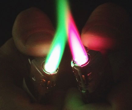 awesomeshityoucanbuy:  Colored Flame LightersSpark up in flamboyant style using the colored flame lighter. The ergonomic design of the lighter provides a comfortable and secure grip while a special feature lets you adjust the color of the flame to one
