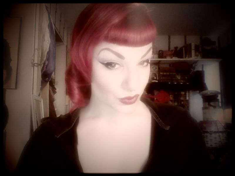 thesmokingstiletto:  Minor change to hair and makeup before heading out tonight…