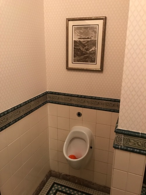 Single urinal at the posh Walt’s restaurant at Disneyland Paris.