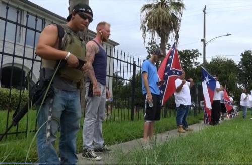 thingstolovefor:  Armed, Confederate flag-waving White Lives Matter protesters rally     Why are these people always finding reasons to hate the black race? If they truly wanted to help the black people, they would not be on the other side of the street