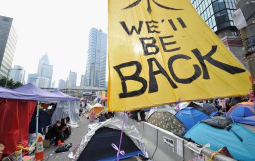 redrubied:  micdotcom:  Inspiring photos show the Hong Kong protesters’ parting gift to the government   Honk Kong’s democracy protests are over — for now.  Hong Kong police arrested pro-democracy activists and cleared out most of the protest