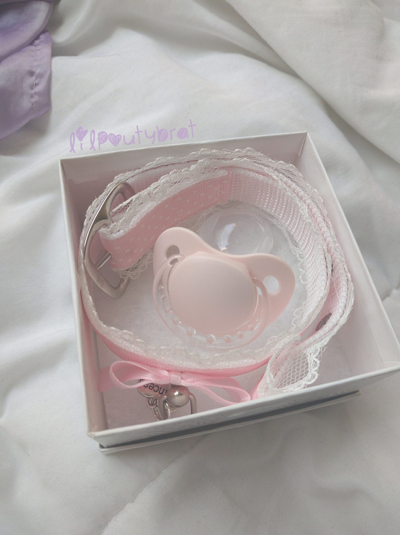 lilpoutybrat:  my binky and my collar stay in this little box when I’m away 💗