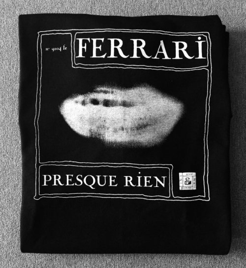 Luc Ferrari - Presque Rien T Shirt - Black Where reality and lies mix.White print on soft black tee.