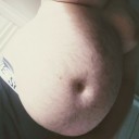 greedycub:Actually cannot believe how big I am now. Up to 205 and looking fat as hell.