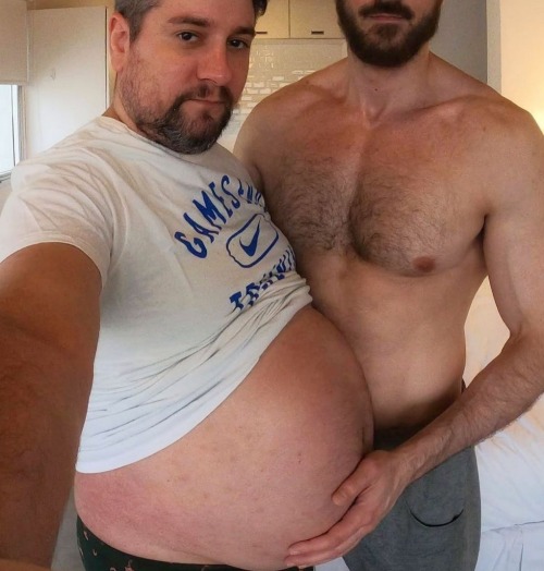 This Couple Is Absolutely Hot!! Looks That Huge Mpreg Belly. Amazing Belly... And The Father Looks Sexy!!!