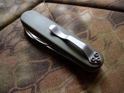 ru-titley-knives:  Custom SAK .This SAK bantam was recently pimped for one of the Packconfig bloggers to his specs http://www.packconfig.com/  . OD green G-10 over black G-10 liners with a stonewashed pocket clip .  GITD green glow dot on the reverse