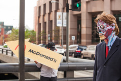 horroroftruant:  &ldquo;They Live&rdquo; Live in Downtown Los Angeles  Artists Stephen Zeigler and Calder Greenwood gave downtown residents a living installation inspired by the classic film  They Live, with signage and actor dressed as an alien in a