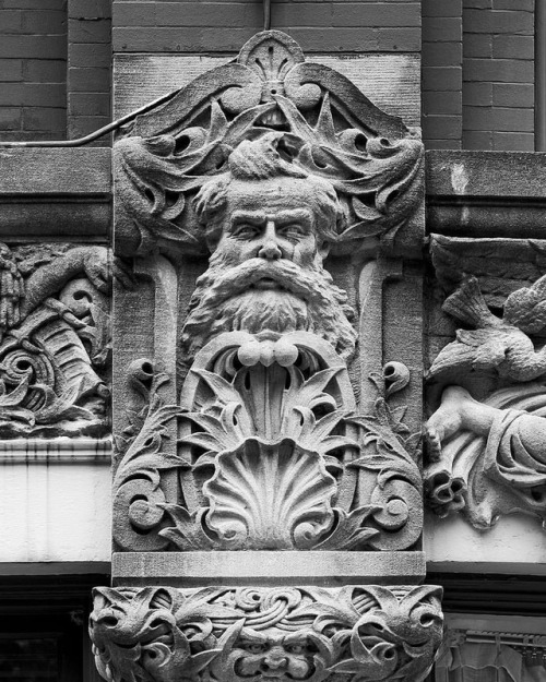 One of many faces on the Drhumor (drummer) Building in Asheville ca 1895. See them all in the North 