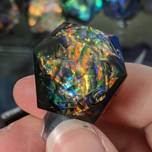 Sometimes you pull a die that just makes you gasp. Prismatic Aether Dragonsoul Opal spindown d20 mad