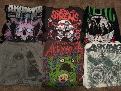 ohioisloko:  K SO I’M HAVING A HUGE GIVEAWAY. it includes (not in order from pictures) ; Abandon All Ships skull w/ candles shirt Sleeping With Sirens zombie shirt Asking Alexandria green letters with band members shirt Kitten concert shirt including