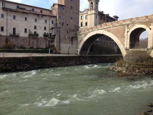 View of the Pons Fabricius and Tiber Island The Pons Fabricius, the oldest remaining bridge in Rome,