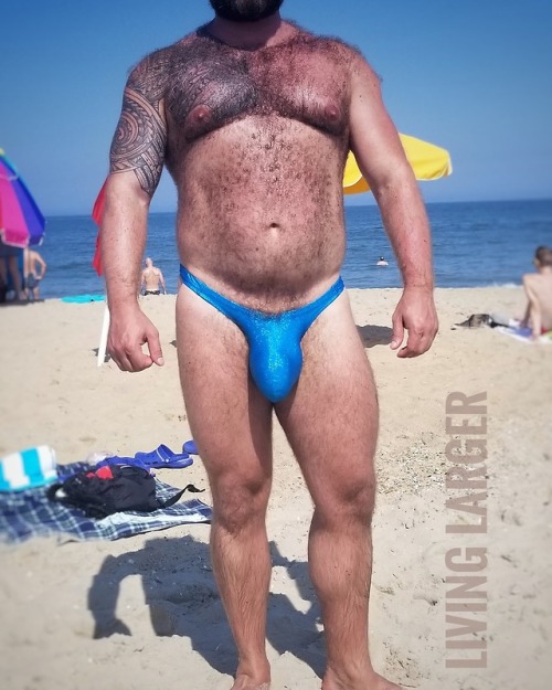 livinglarger: On the beach showing off in an @mwearnyc thong. Someone referred to me as “the g