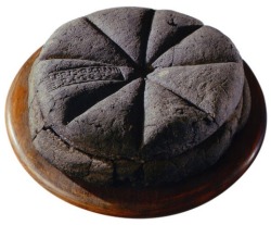 ironychan:  hungrylikethewolfie:  dduane:  wine-loving-vagabond:  A loaf of bread made in the first century AD, which was discovered at Pompeii, preserved for centuries in the volcanic ashes of Mount Vesuvius. The markings visible on the top are made