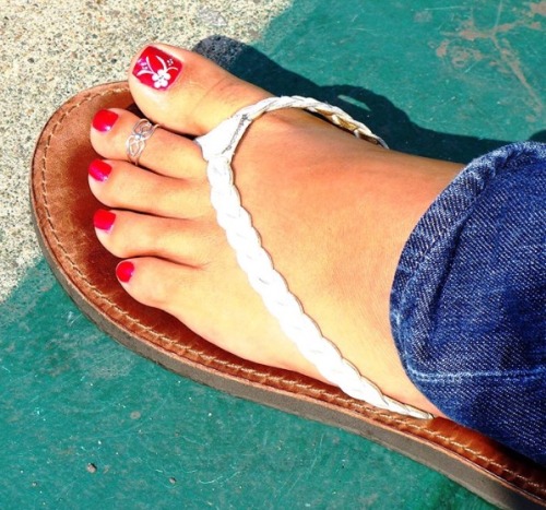 Pretty feet and toes in sexy braided thong sandals.