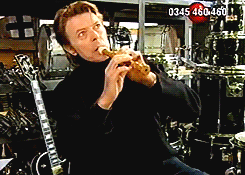 trendy-rechauffe:David Bowie playing the recorder, badly. [x]