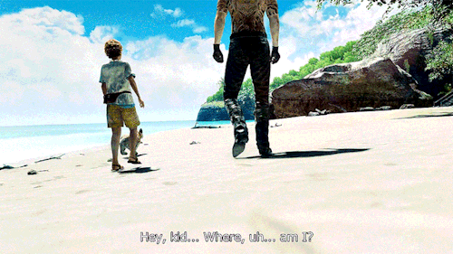 A gif of Majima and a small boy walking across a beach in the middle of the day. They're walking away from the camera. Majima is shirtless and dirty. His subtitle says: Hey, kid.... where, uh.... am I?
