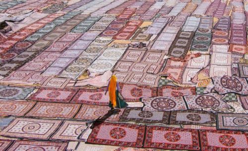 Submit your best shots to our 15th Annual Photo Contest, open now! Photo: A Woman in a Sea of SarisP