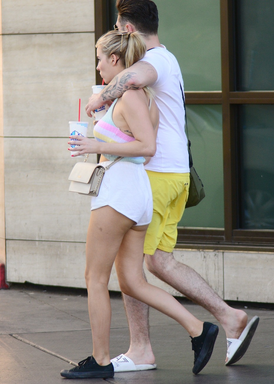 Showing a little cheek with those shorts.