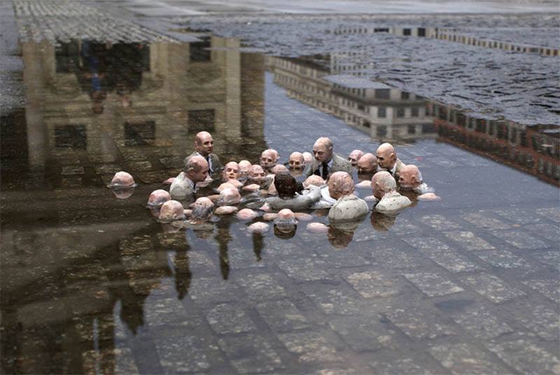 jessehimself:  This sculpture by Issac Cordal in Berlin is called “Politicians