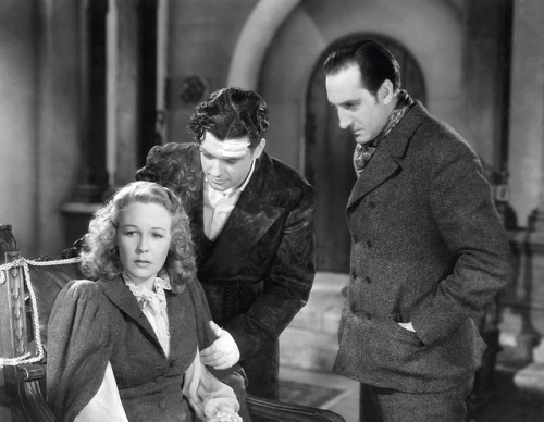 Wendy Barrie, Richard Greene and Basil Rathbone as Sherlock Holmes in The Hound of the Baskervilles 