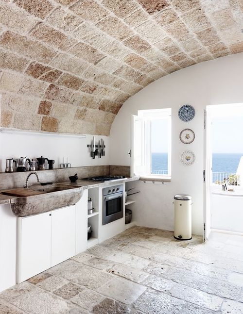 Nice looking cottage kitchen at a place by the sea. Not sure what the back slash is but love the faucet fixture installed by the plumber. A nice blend of modern and rustic. Would love to see more of this place and know where it is.