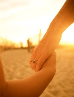 Father and daughter holding hands