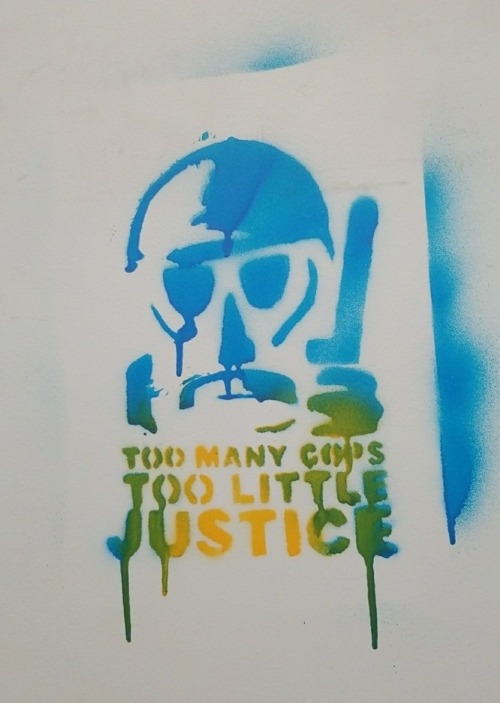 “Too many cops, too little justice”Seen in the squatted Paddington Green police station in London