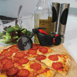 dailycoolgadgets:  Chopper Motorcycle Pizza CutterHere’s a little device to get your motor running whether you were born to be wild or just kinda like both motorcycles and delicious pizza.  Never has the word chopper been more accurately applied than