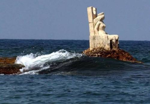 ancientorigins:Statue of queen Zenobia in the middle of the Mediterranean Sea, Lattakia, Syria