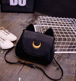 walkintheirfootsteps:  wickedclothes:  sailor moon handbag  Hey! I have this purse! I love love love it!!! 