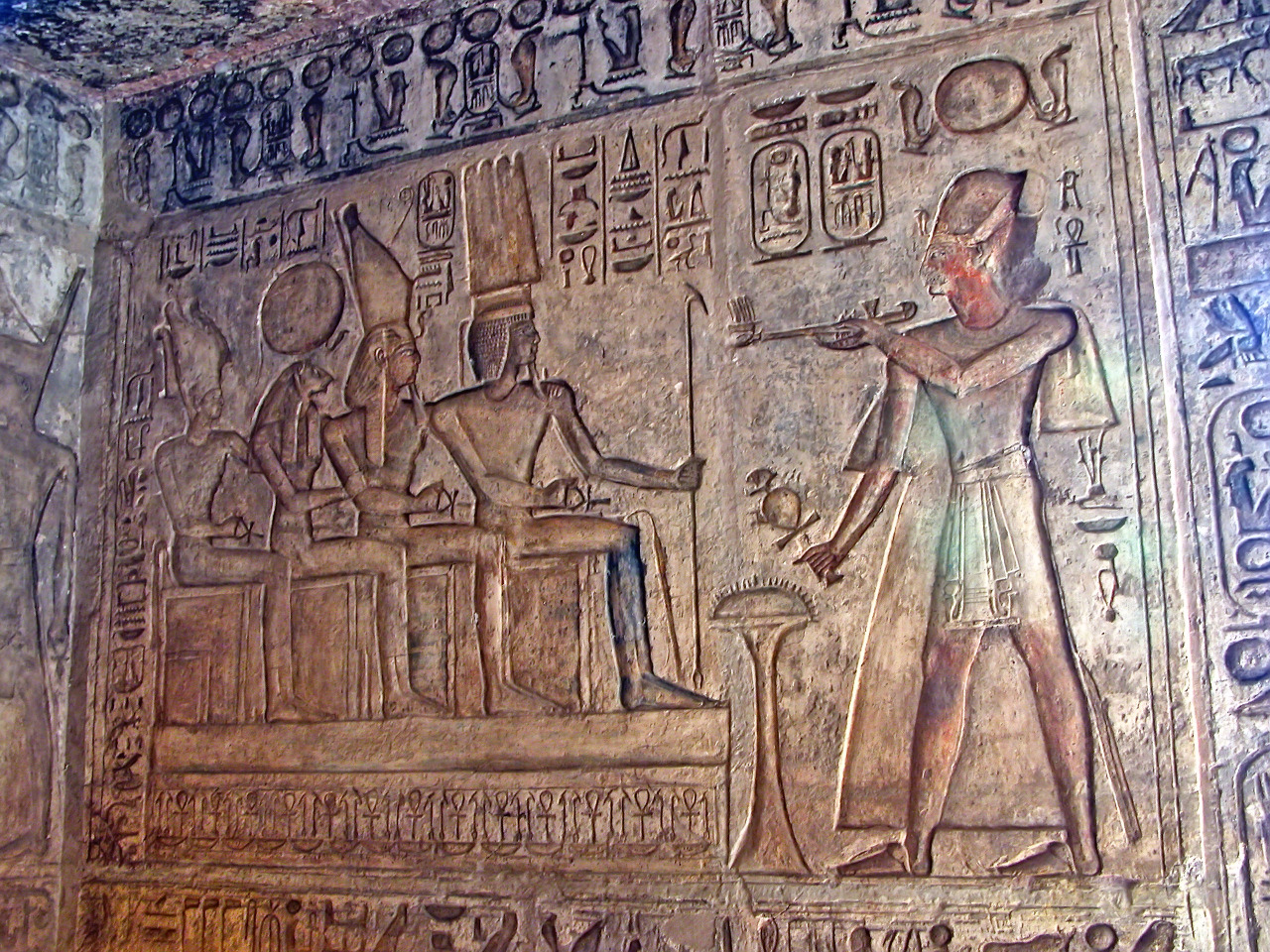 dwellerinthelibrary:  Ramesses II worshipping himself (second from the right), along