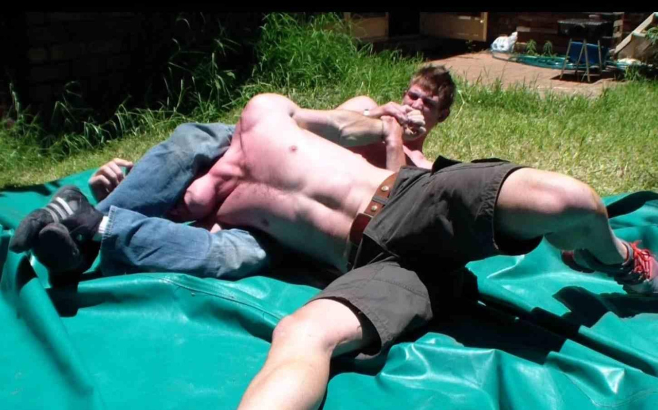 this is manly shit, just stripping ur shirt off in the backyard under the sun and fuckin going at it like MEN with another MAN…….shirts vs jeans, still in sneakers, but shirtless…..real men fight shirtless…….jeans locks in a head scissors and...