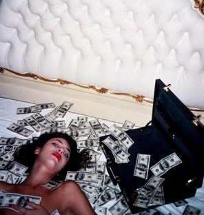 Femme Fatale GEMINIChampagne enthusiast, a double agent, found dead on a pile of money