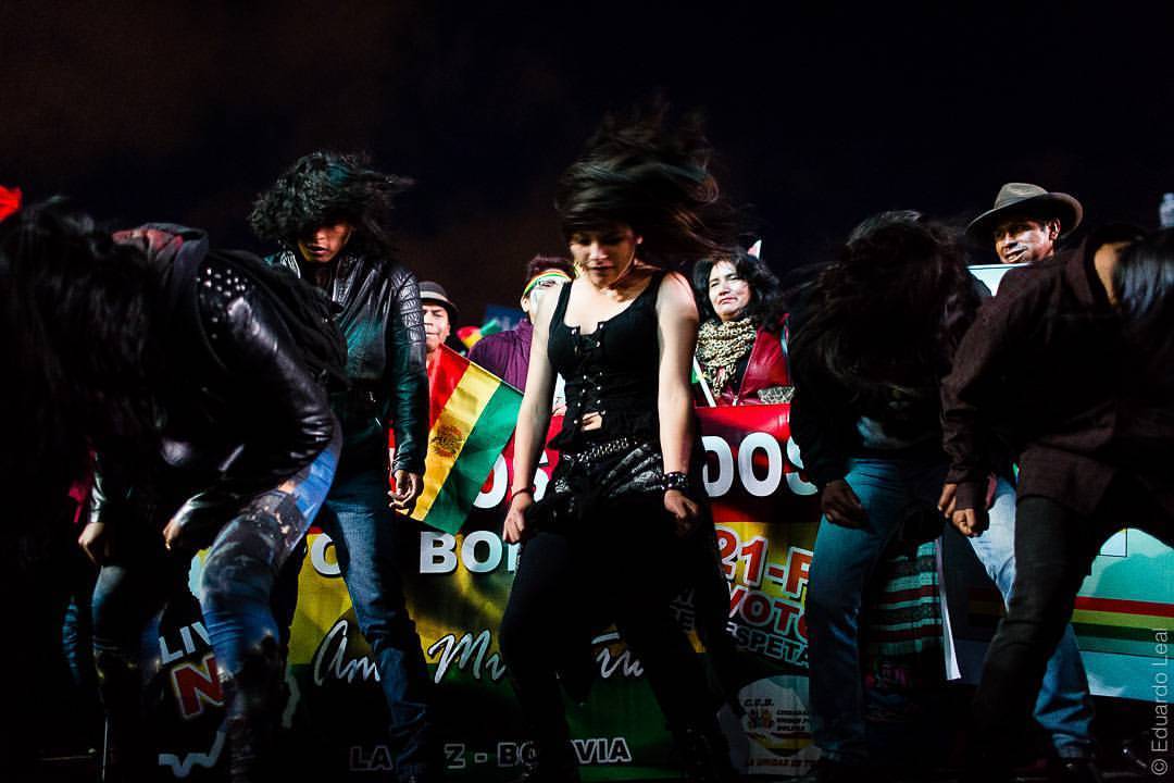 Youngsters dance at the sound of heavy-metal during the demonstration for the NO against the change of the Bolivian constitution one year after the referendum. A year ago the campaign for the NO won the referendum but President Evo Morales and the...