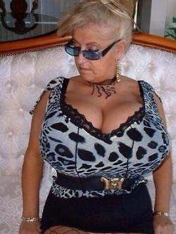 boobfiend:  wow she maybe a granny but l bet those huge tits are nice and saggy and drop down to her bellybutton