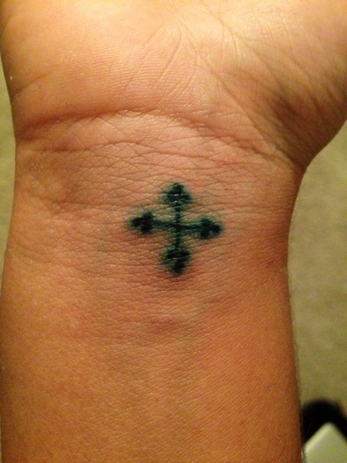 thategyptiangirlnardin:Coptic cross. This is a symbol of the persecution we have faced through the years, a symbol of ho