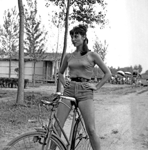 christianrichardrice: Italian actress Elsa Martinelli sitting on a bicycle during the shooting of th