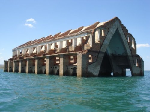 abandonedography: Petrolandia is home to one of Brazil’s largest hydroelectric power plants—during construction, entire towns were moved to higher ground due to flooding. One vestige of the old landscape still remains: the arches of a church that