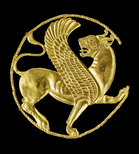 dwellerinthelibrary: “This snarling winged lion worked in gold repoussé attests to the 