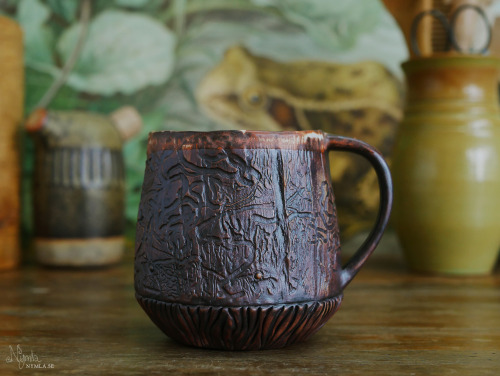 Bugmugs! The patterns are made from woodborer insects that left their marks in branches that I colle